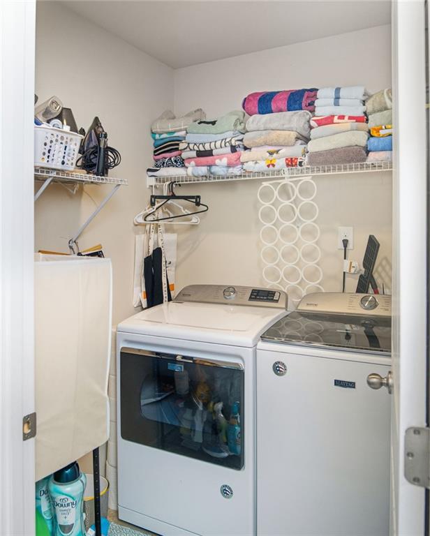 132 Centennial Ridge Drive Acworth, GA 30102 - Photo 24 of 38 a utility room with a sink a stove and wooden floor