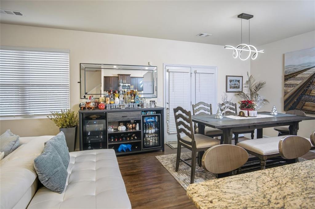 132 Centennial Ridge Drive Acworth, GA 30102 - Photo 3 of 38 a bedroom with furniture and a wooden floor