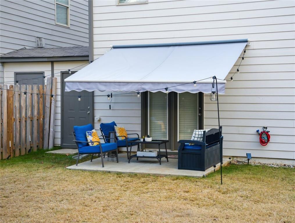 132 Centennial Ridge Drive Acworth, GA 30102 - Photo 34 of 38 a view of a chairs and table in the patio