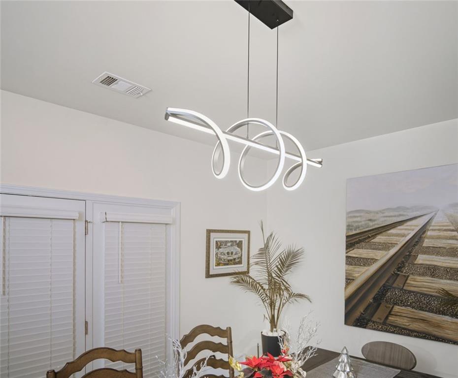 132 Centennial Ridge Drive Acworth, GA 30102 - Photo 5 of 38 a view of a room with gym equipment