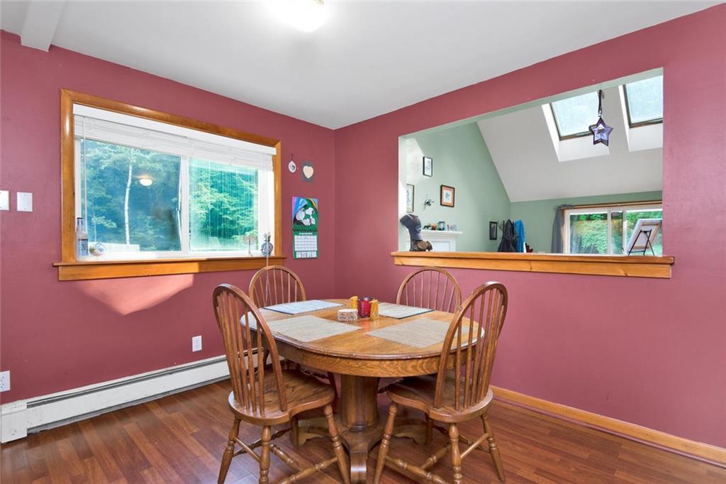425 North Shore Road New Gloucester, ME 04260 - Photo 4 of 29 Dining area has plenty of room and...