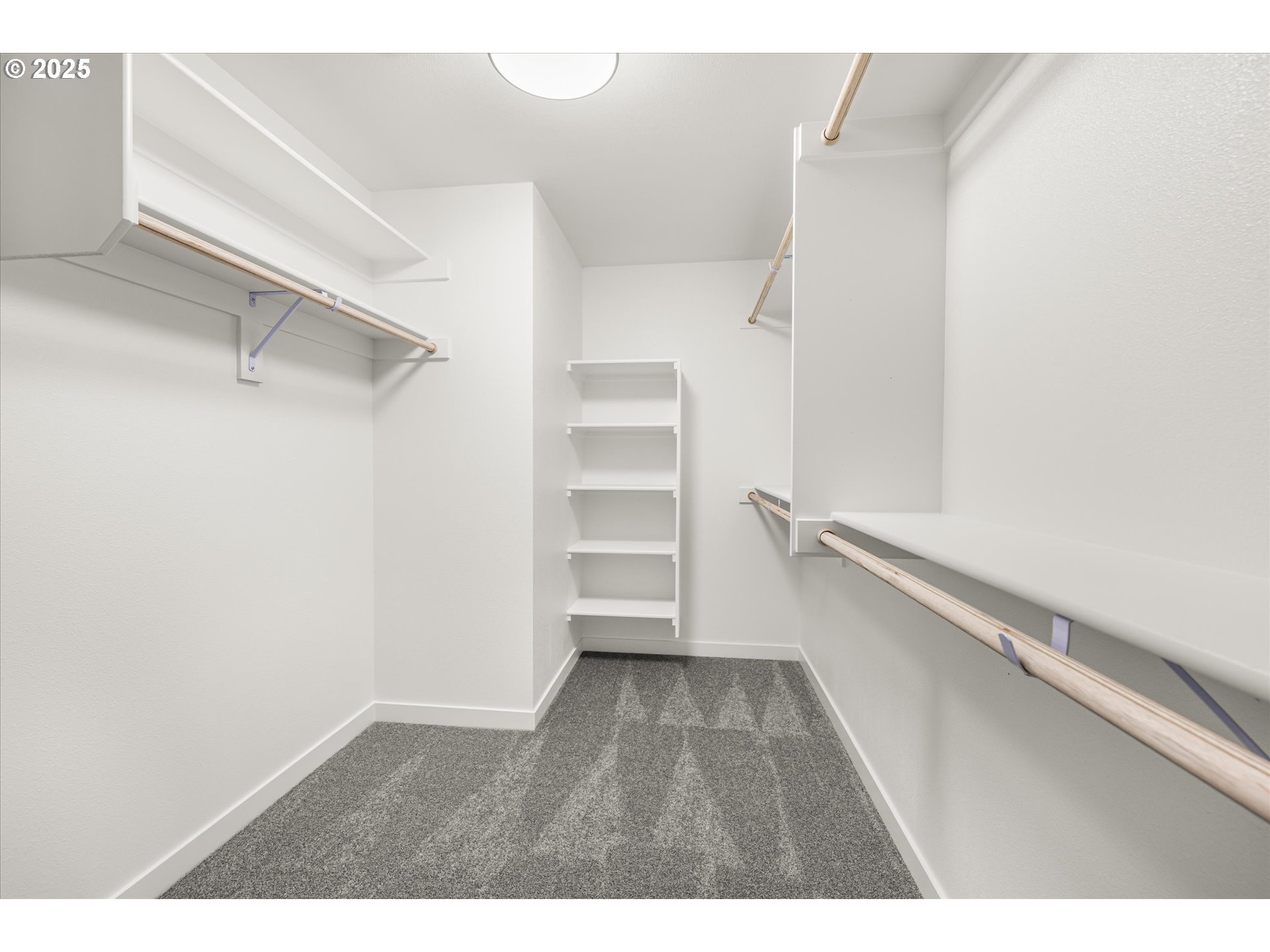 2360 Northwest 3rd Street Gresham, OR 97030 - Photo 34 of 45 a view of walk in closet with empty racks