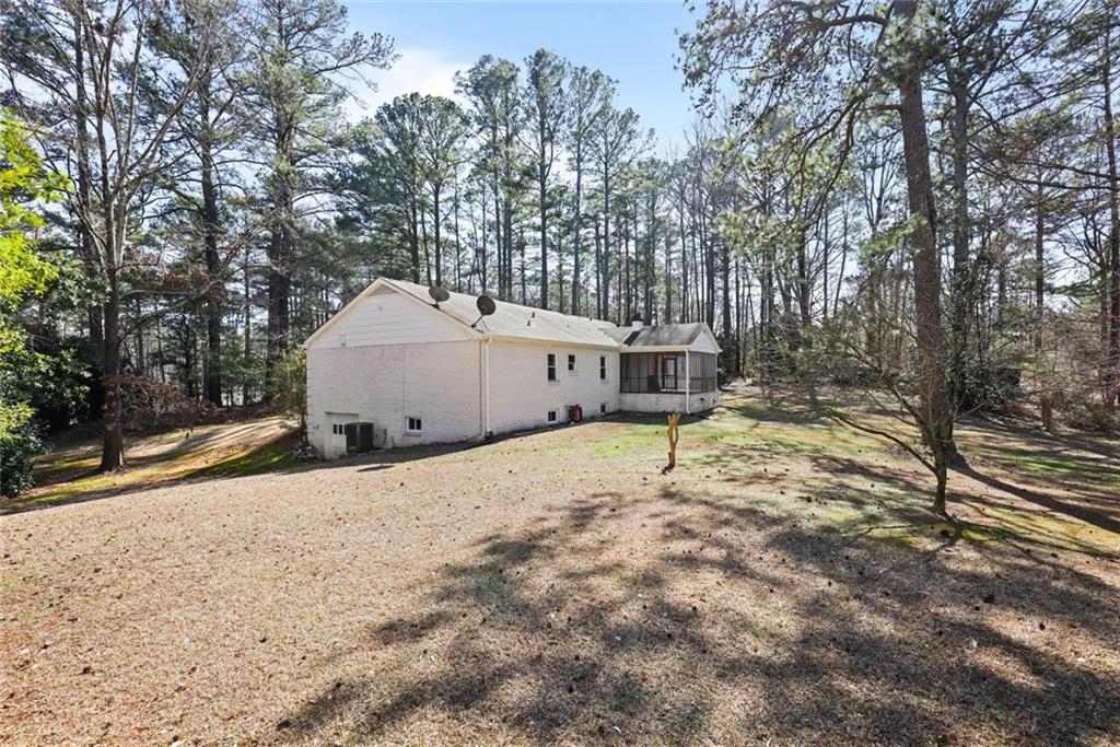 4505 Cochran Mill Road Fairburn, GA 30213 - Photo 32 of 36 a house view with a outdoor space
