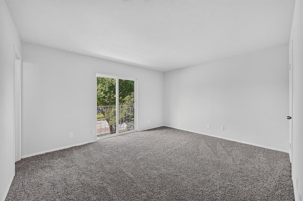 1801 East Grauwyler Road, Unit 101 Irving, TX 75061 - Photo 26 of 39 a view of an empty room with a window