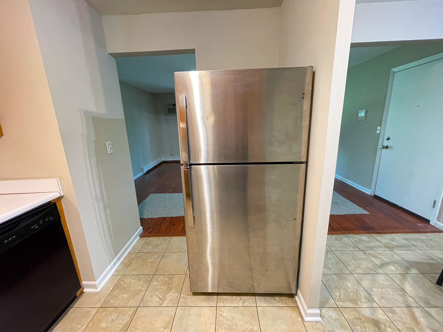 19360 Wolf Road, Unit 8 Mokena, IL 60448 - Photo 11 of 23 a refrigerator freezer sitting in a kitchen