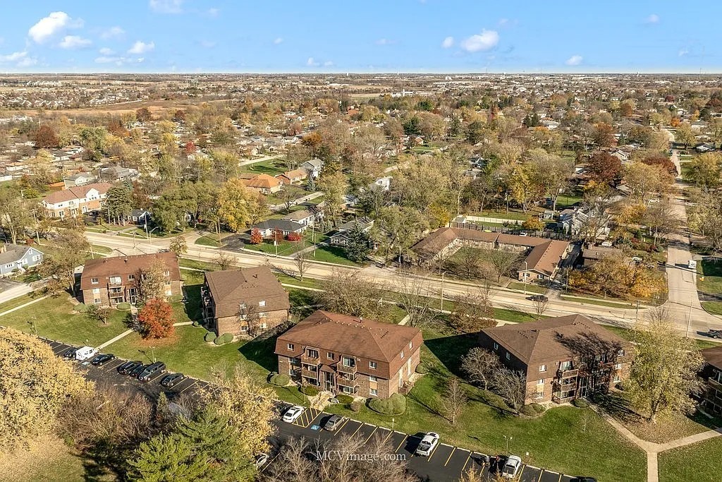 19360 Wolf Road, Unit 8 Mokena, IL 60448 - Photo 22 of 23 an aerial view of residential houses with outdoor space