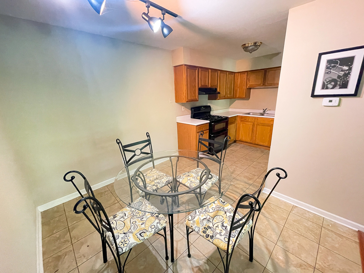 19360 Wolf Road, Unit 8 Mokena, IL 60448 - Photo 7 of 23 a view of a dining room with furniture