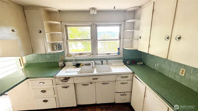 a bathroom with a sink and a bathtub