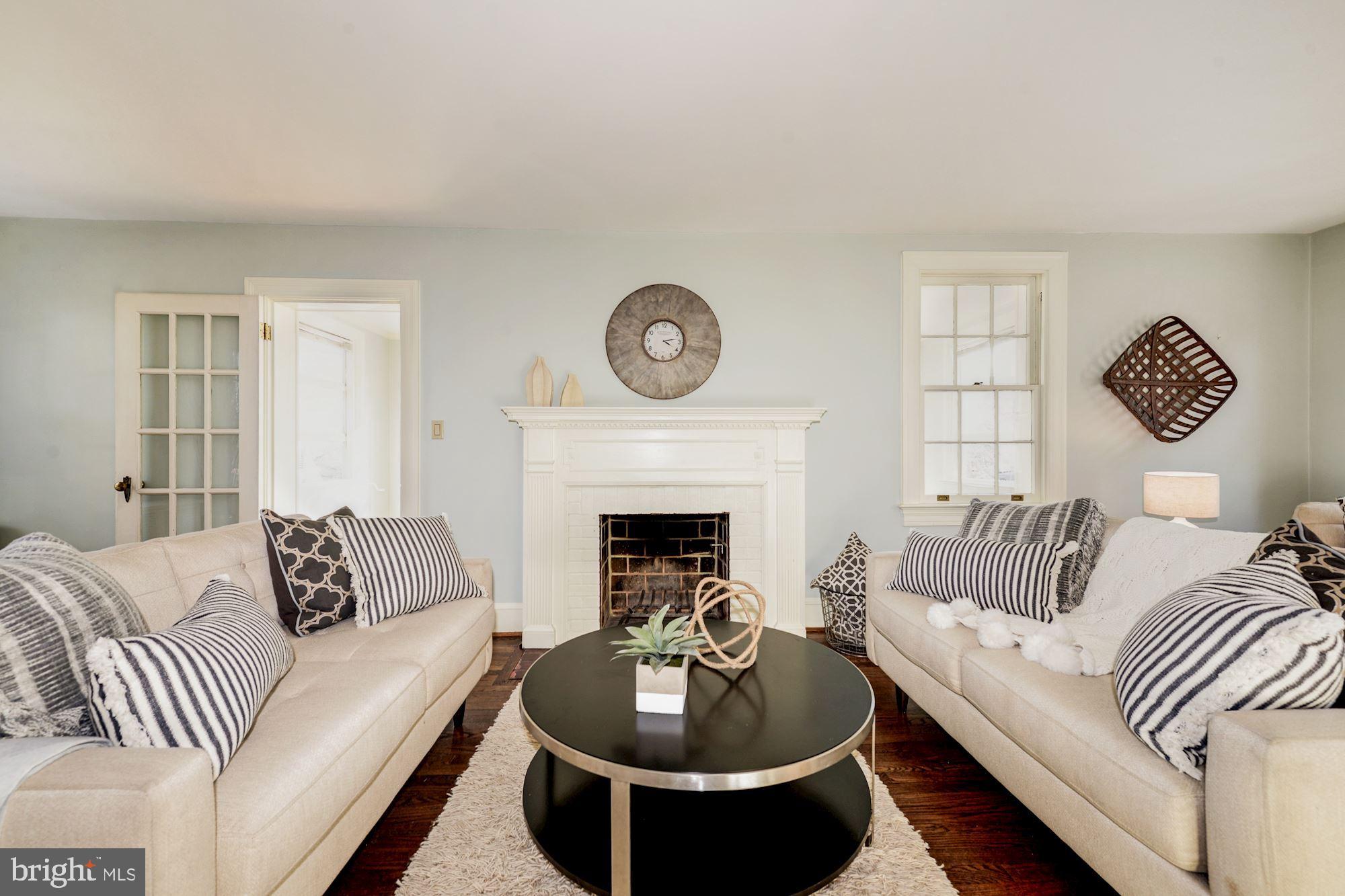 1705 Russell Road Alexandria, VA 22301 - Photo 5 of 39 Living Room With Wood Burning Fireplace