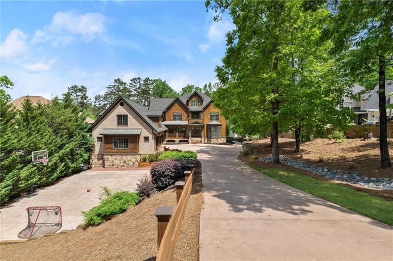 4290 Bobbins Way Cumming, GA 30041 - Photo 110 of 133 a front view of a house with a yard