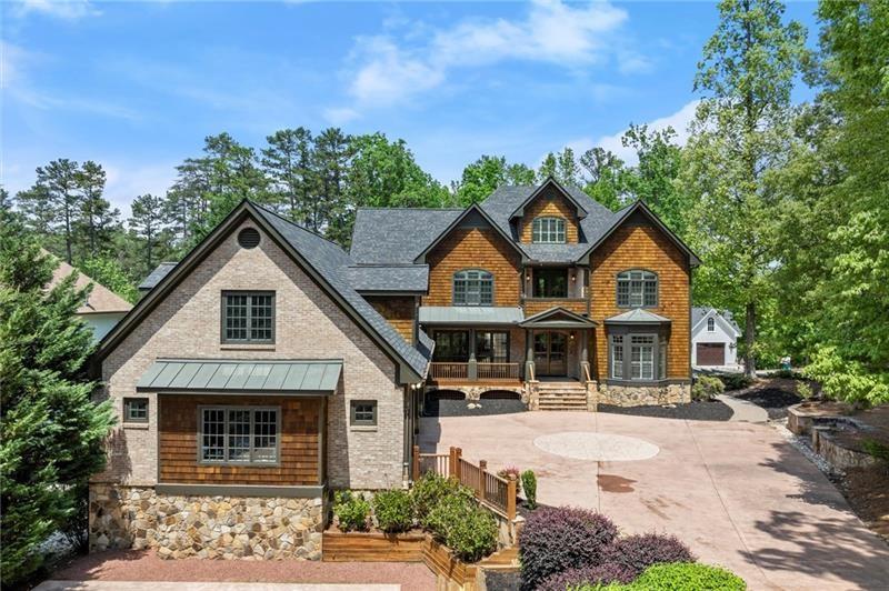 4290 Bobbins Way Cumming, GA 30041 - Photo 113 of 133 a front view of a house with garden