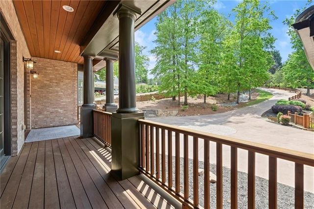 a kitchen with stainless steel appliances granite countertop a sink dishwasher and a wooden cabinets