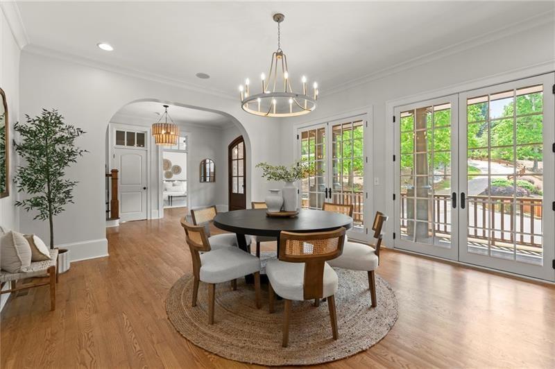 4290 Bobbins Way Cumming, GA 30041 - Photo 19 of 133 a view of a dining room with furniture window and wooden floor