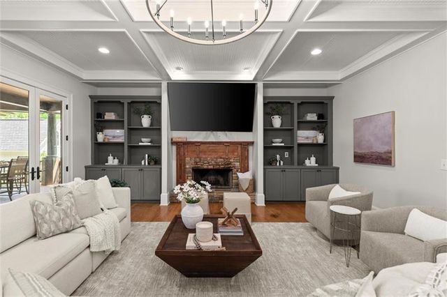 a bathroom with a tub a sink and a window