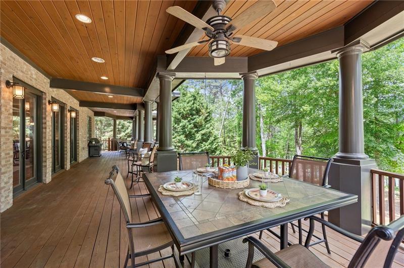 4290 Bobbins Way Cumming, GA 30041 - Photo 40 of 133 a view of a dining room with furniture window and outside view