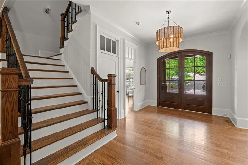 4290 Bobbins Way Cumming, GA 30041 - Photo 42 of 133 a view of entryway with wooden floor and stairs