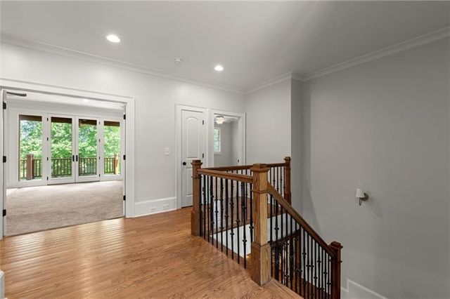 a view of an empty room with a balcony
