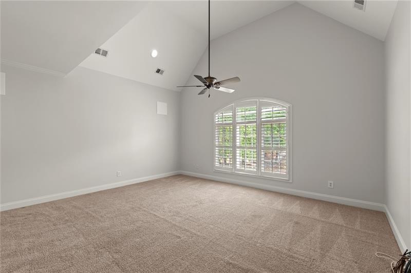 4290 Bobbins Way Cumming, GA 30041 - Photo 62 of 133 a view of a livingroom with a ceiling fan and window