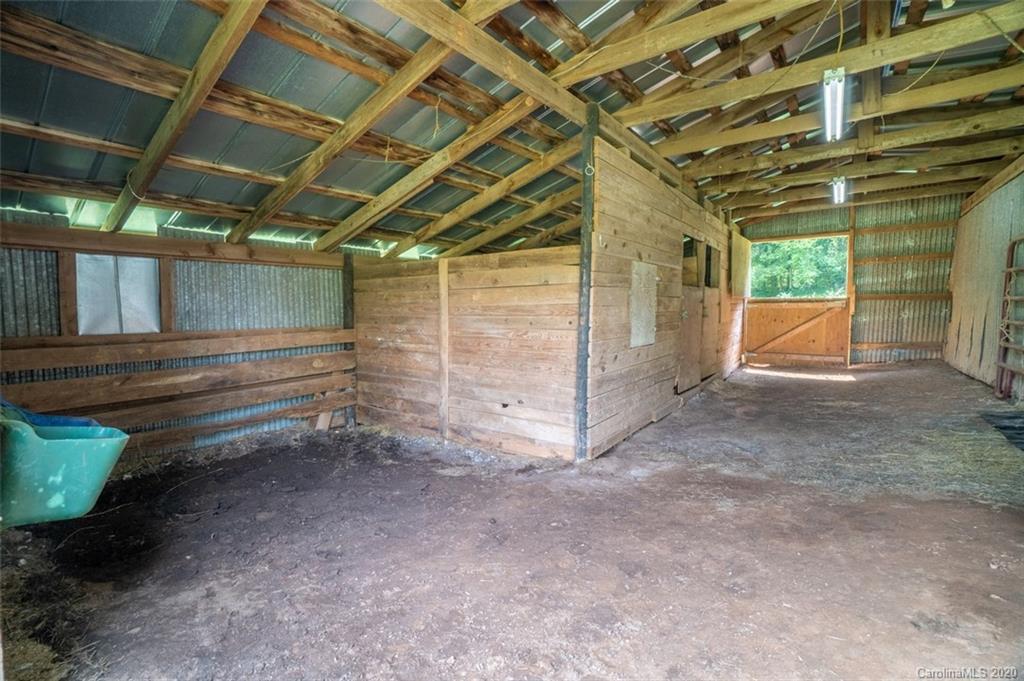 185 Hunter Bridge Road Stony Point, NC 28678 - Photo 31 of 47 a view of a room with wooden walls