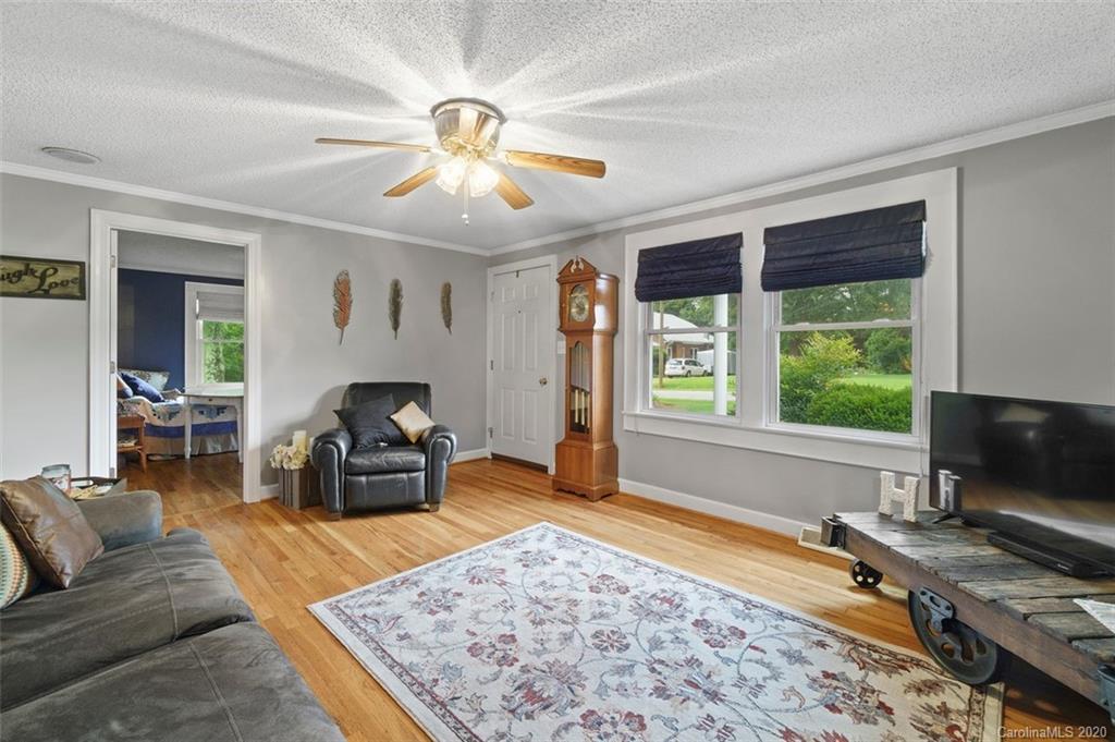 185 Hunter Bridge Road Stony Point, NC 28678 - Photo 6 of 47 a living room with furniture and a large window