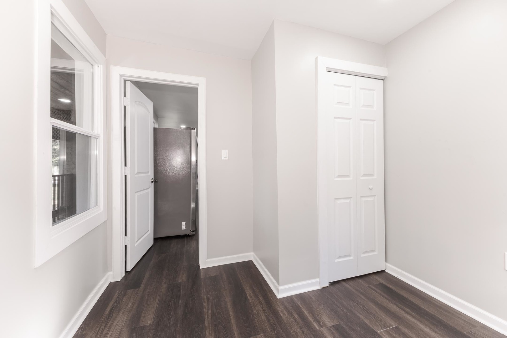306 East Martin Street Forrest, IL 61741 - Photo 18 of 32 a view of a hallway with wooden floor