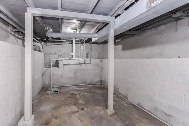 a view of a room with racks on the wall