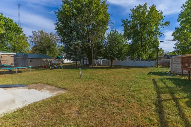 a view of a house with swimming pool