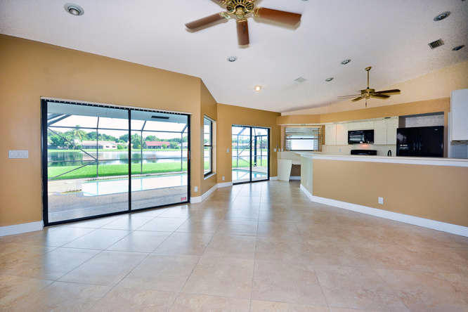 22450 Ensenada Way Boca Raton, FL 33433 - Photo 7 of 22 Family room opens to kitchen