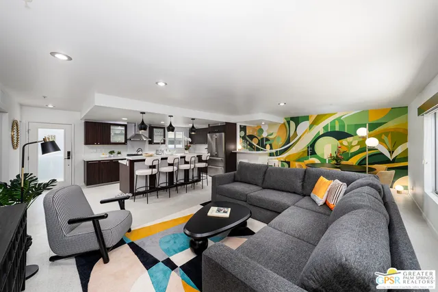 a bedroom with a bed and a table in it