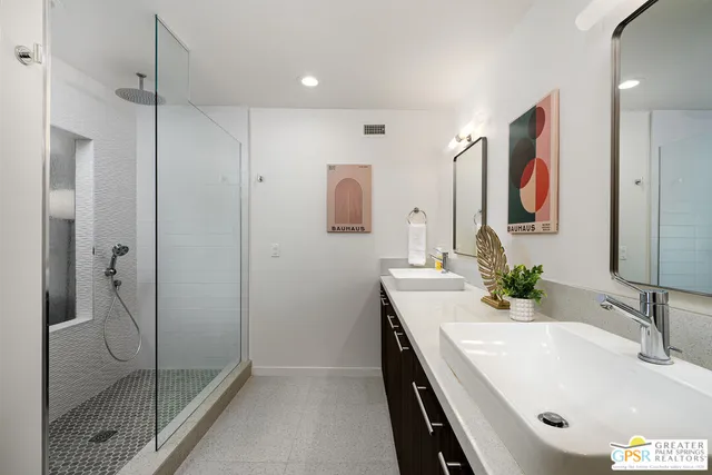 a view of a swimming pool with a lounge chairs