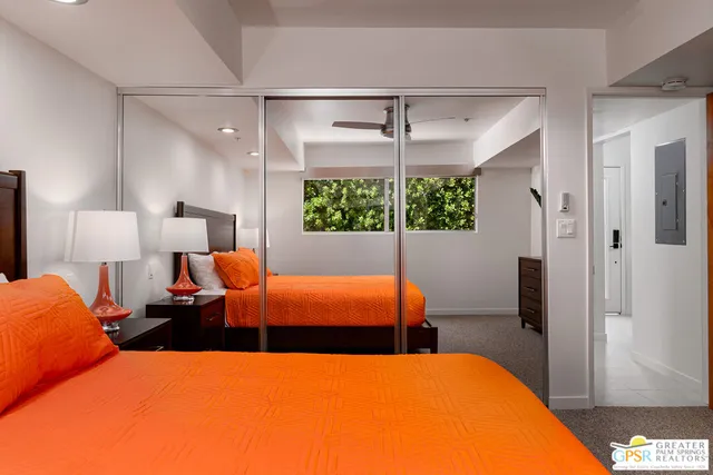 a view of swimming pool with chairs