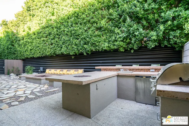 a view of a swimming pool with an outdoor space