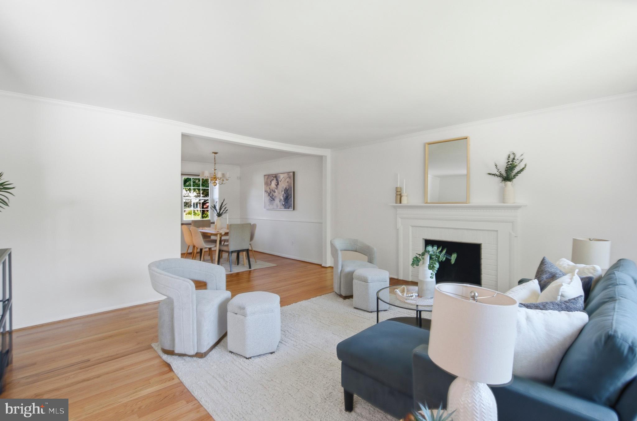 220 Solway Road Lutherville-Timonium, MD 21093 - Photo 3 of 38 a living room with furniture and a fireplace