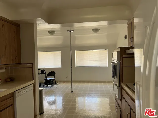 a bathroom with a tub and a shower