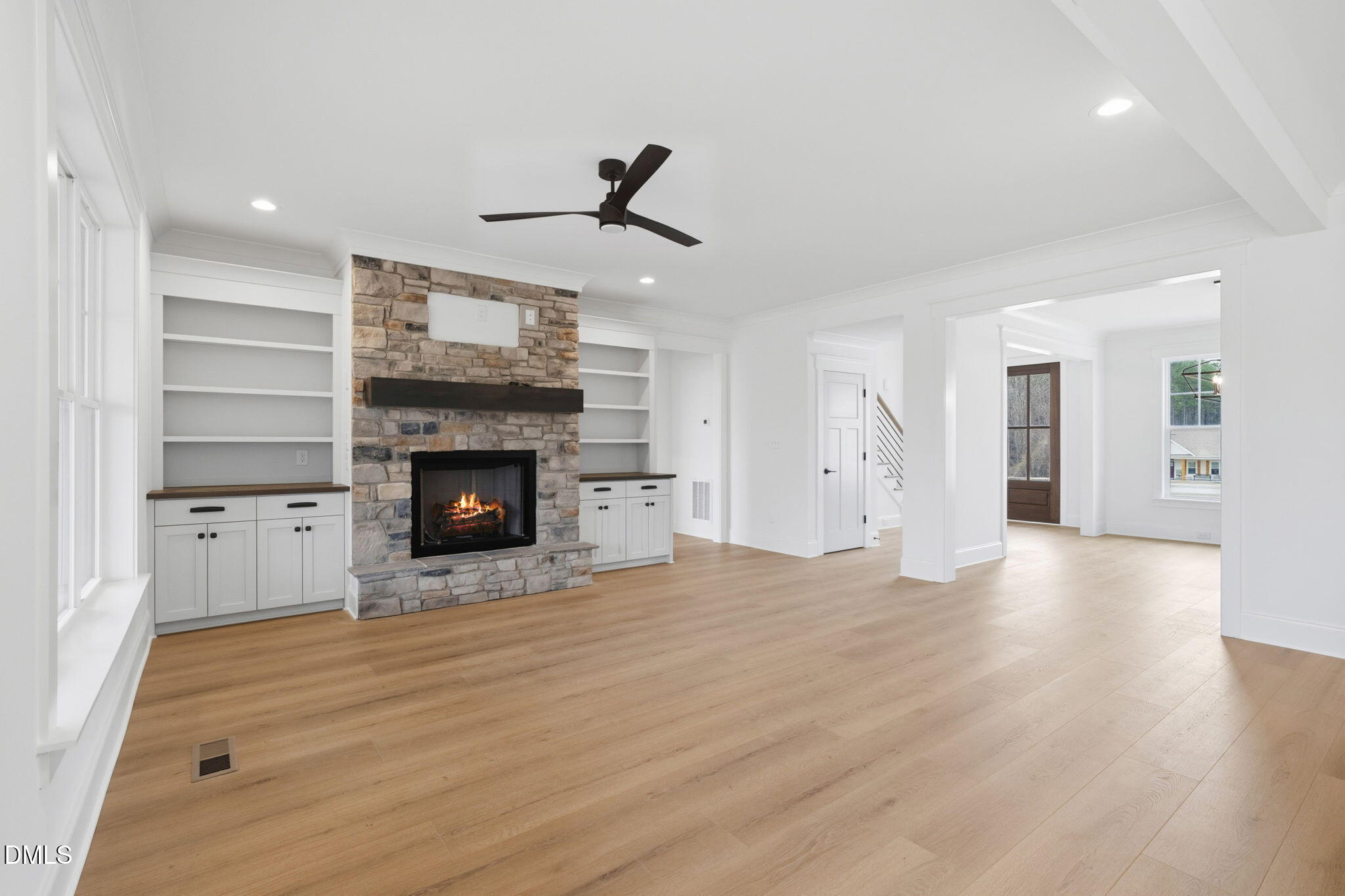 11214 Old Beulah Road Kenly, NC 27542 - Photo 11 of 56 a view of an empty room with a fireplace and a window