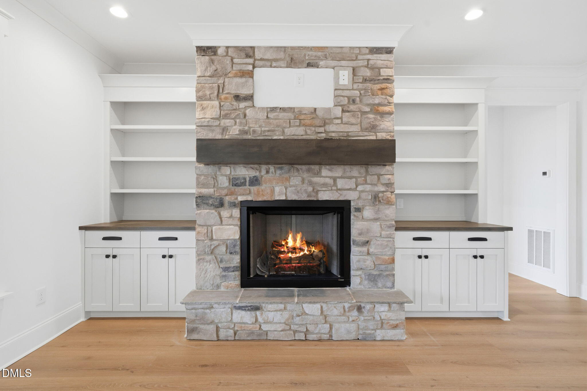 11214 Old Beulah Road Kenly, NC 27542 - Photo 13 of 56 a living room with furniture and a fireplace