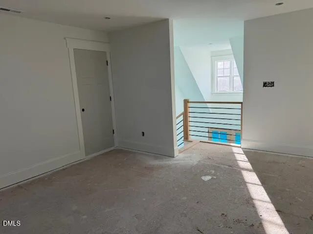 a view of a room that has a window in it