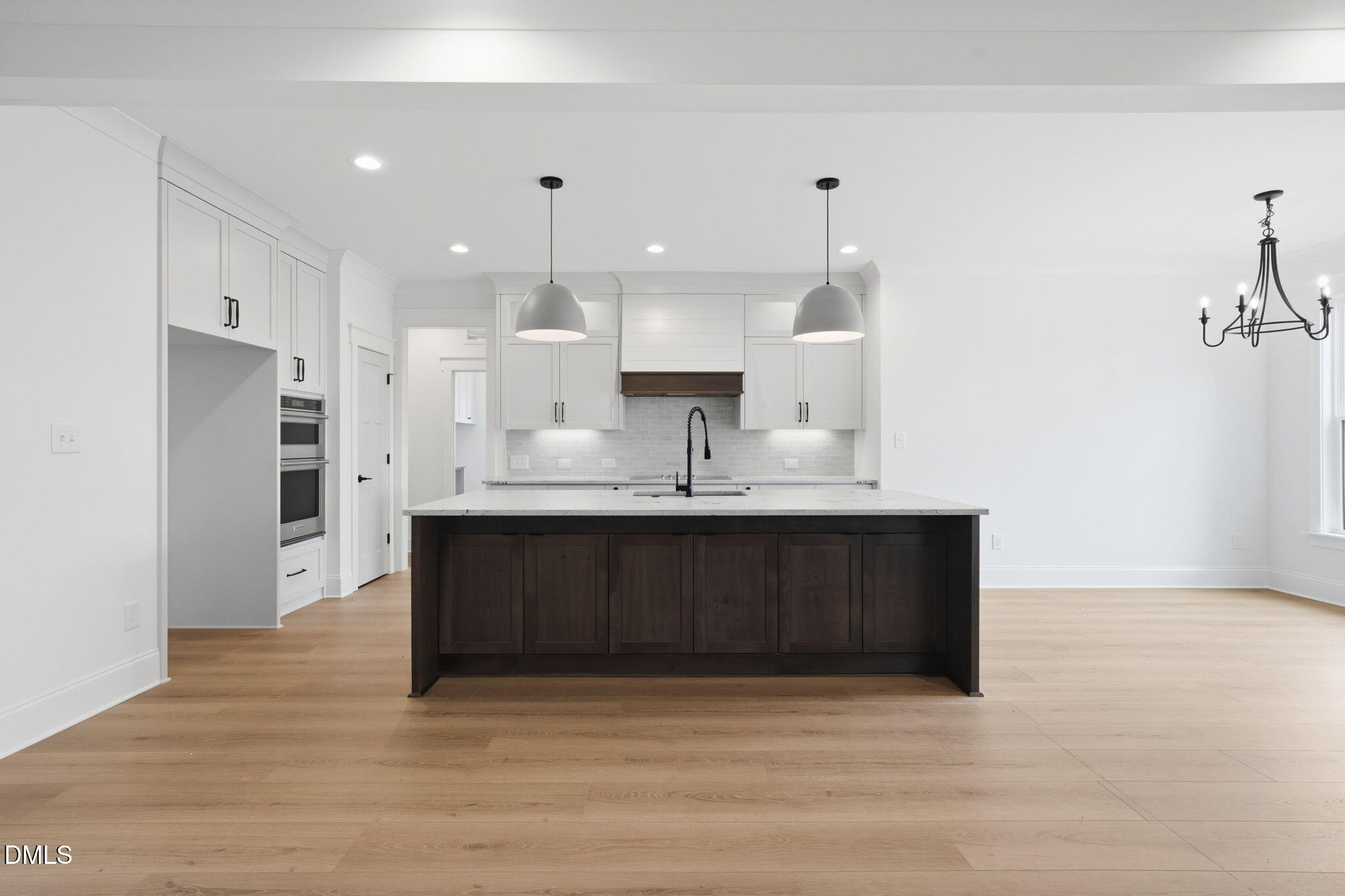11214 Old Beulah Road Kenly, NC 27542 - Photo 15 of 56 a kitchen with stainless steel appliances granite countertop a stove a sink and a refrigerator