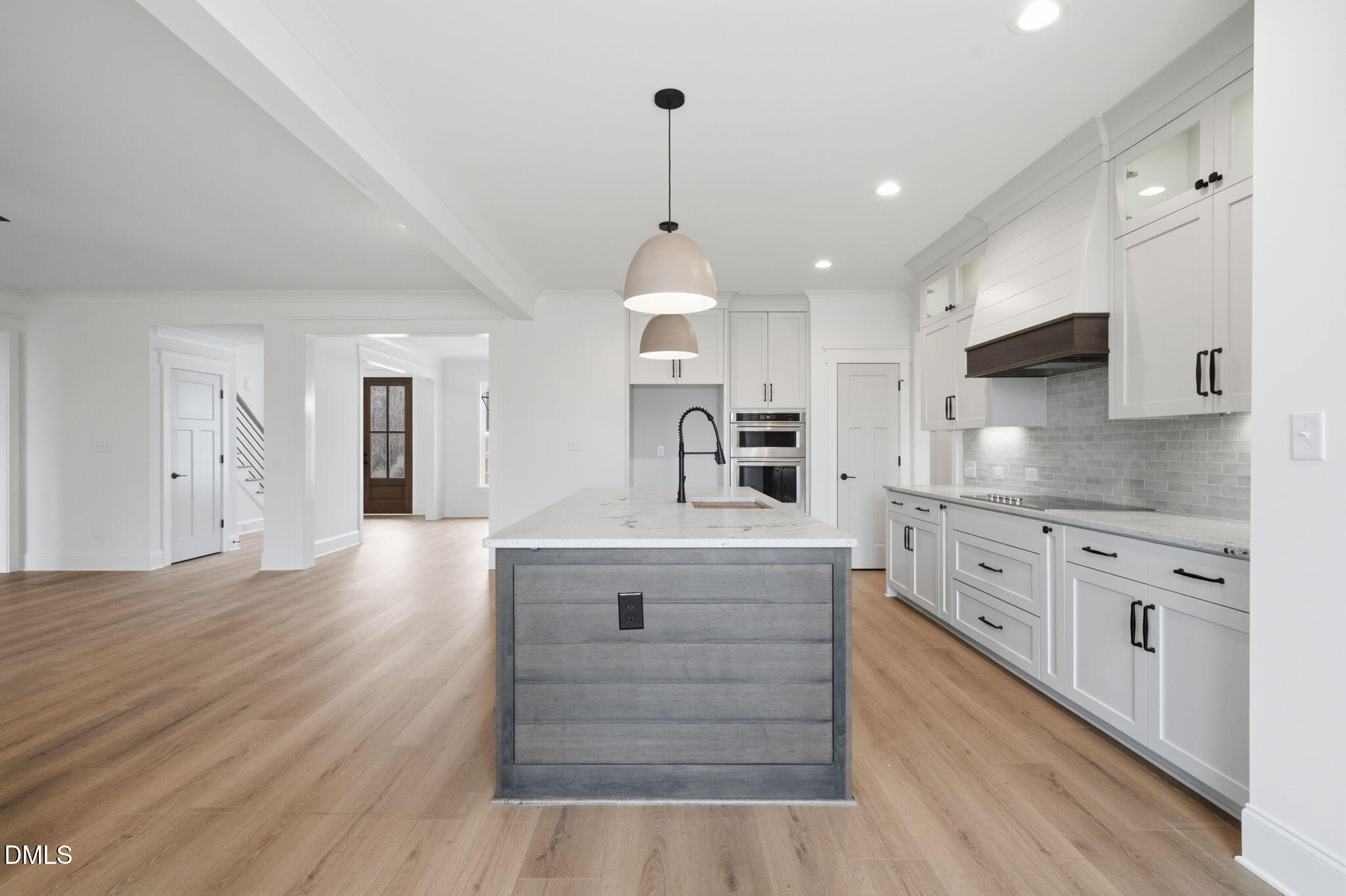11214 Old Beulah Road Kenly, NC 27542 - Photo 20 of 56 a kitchen with granite countertop a stove oven and a sink