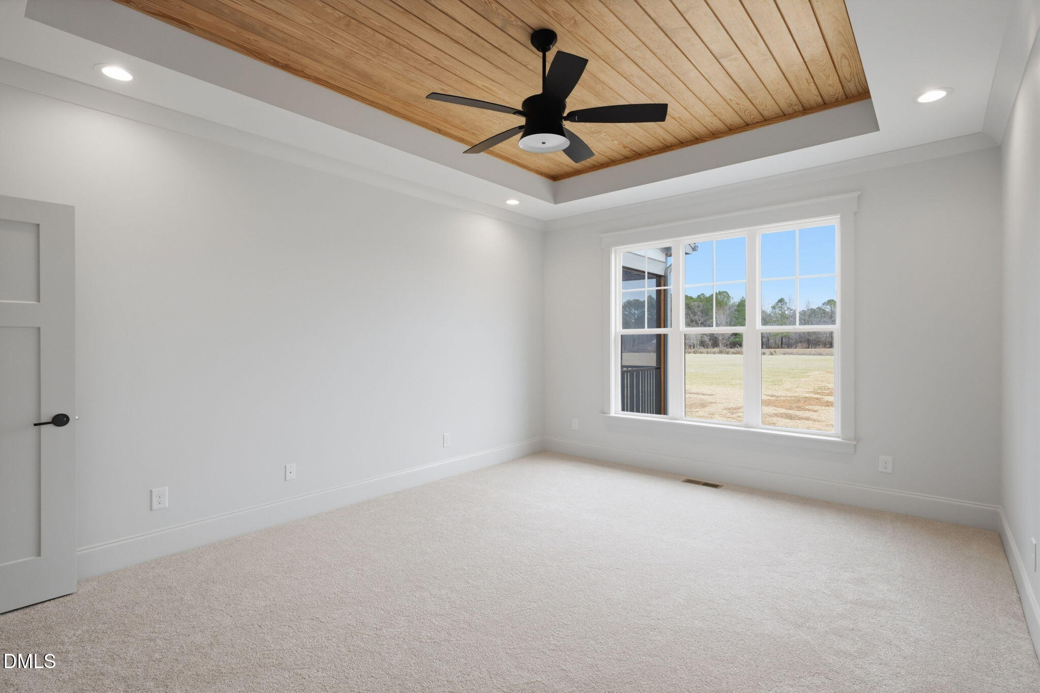 11214 Old Beulah Road Kenly, NC 27542 - Photo 27 of 56 a view of an empty room with a window