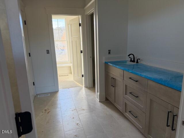 11214 Old Beulah Road Kenly, NC 27542 - Photo 3 of 21 a bathroom with a sink and a mirror