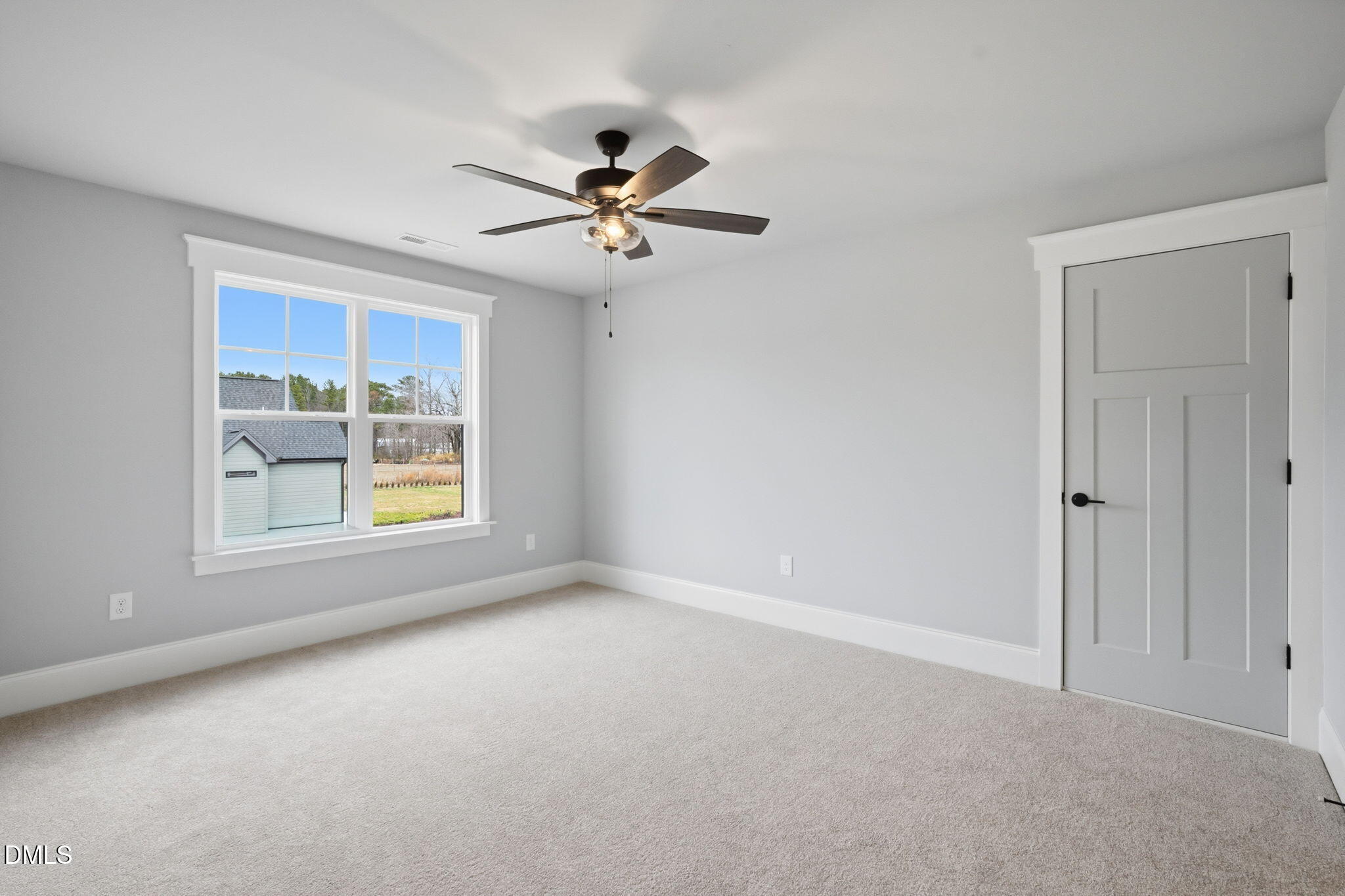 11214 Old Beulah Road Kenly, NC 27542 - Photo 38 of 56 a view of an empty room with a window