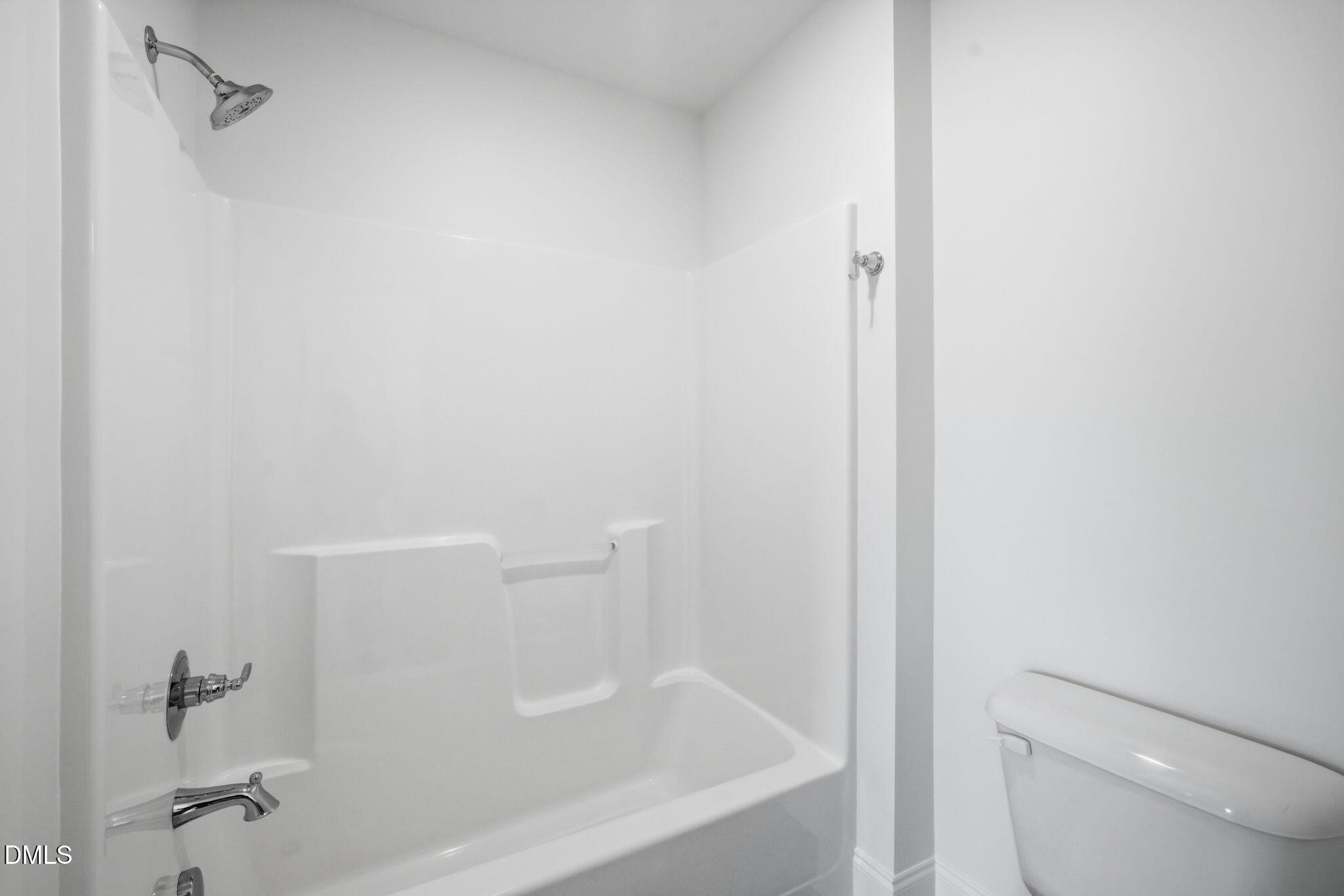 11214 Old Beulah Road Kenly, NC 27542 - Photo 40 of 56 a close up of a bathtub in a bathroom