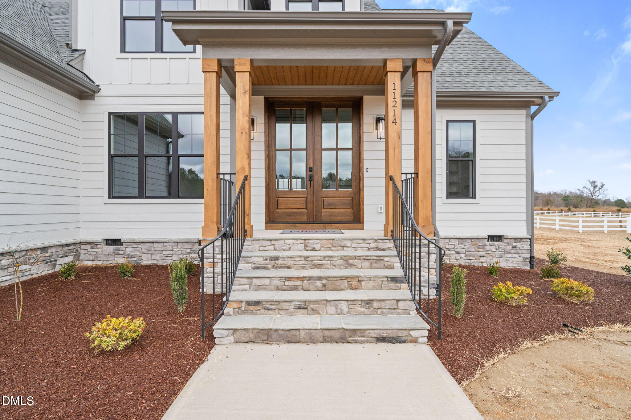 11214 Old Beulah Road Kenly, NC 27542 - Photo 4 of 56 a view of a entryway door front of house