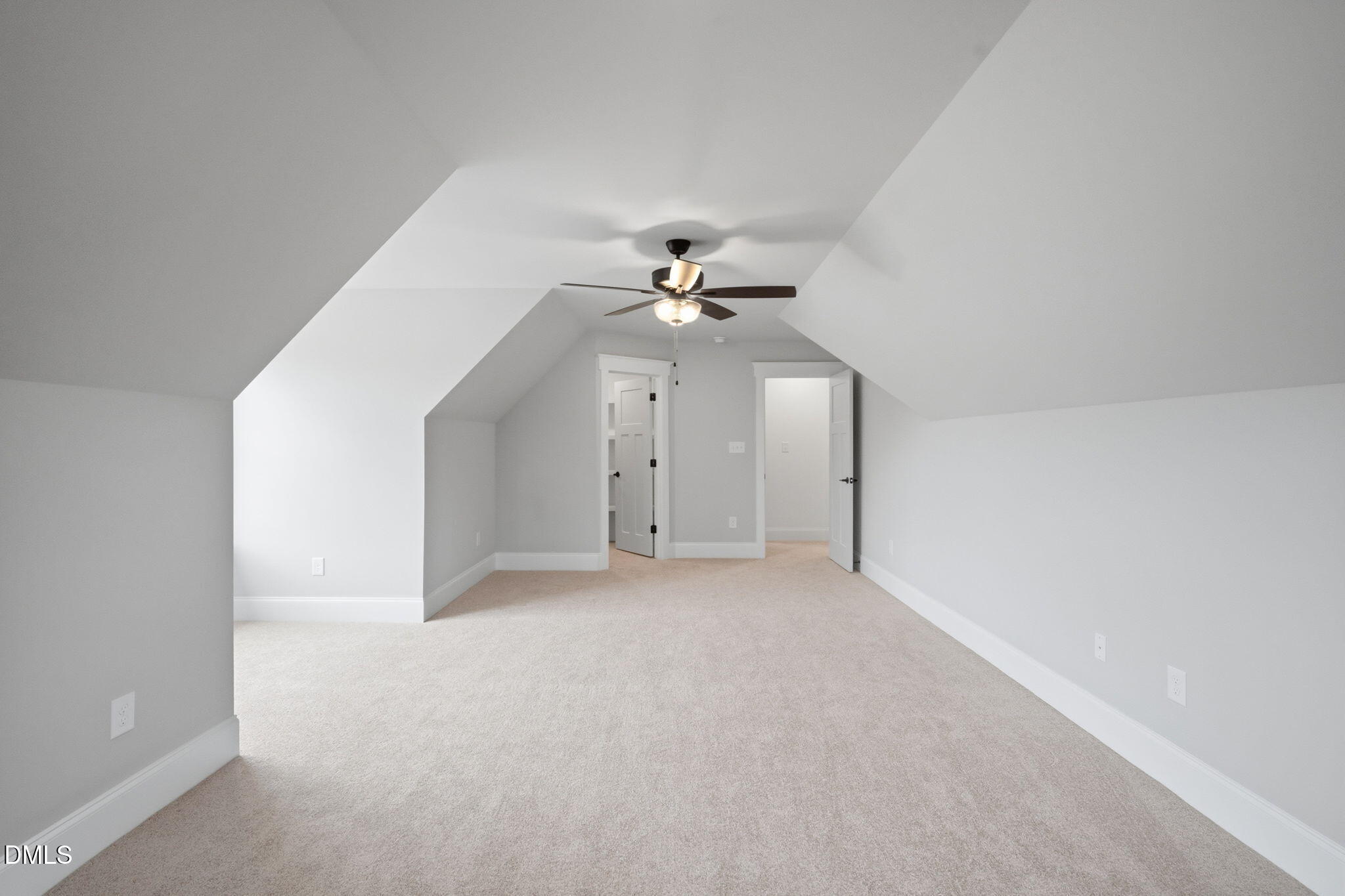 11214 Old Beulah Road Kenly, NC 27542 - Photo 45 of 56 an empty room with a ceiling fan and a window
