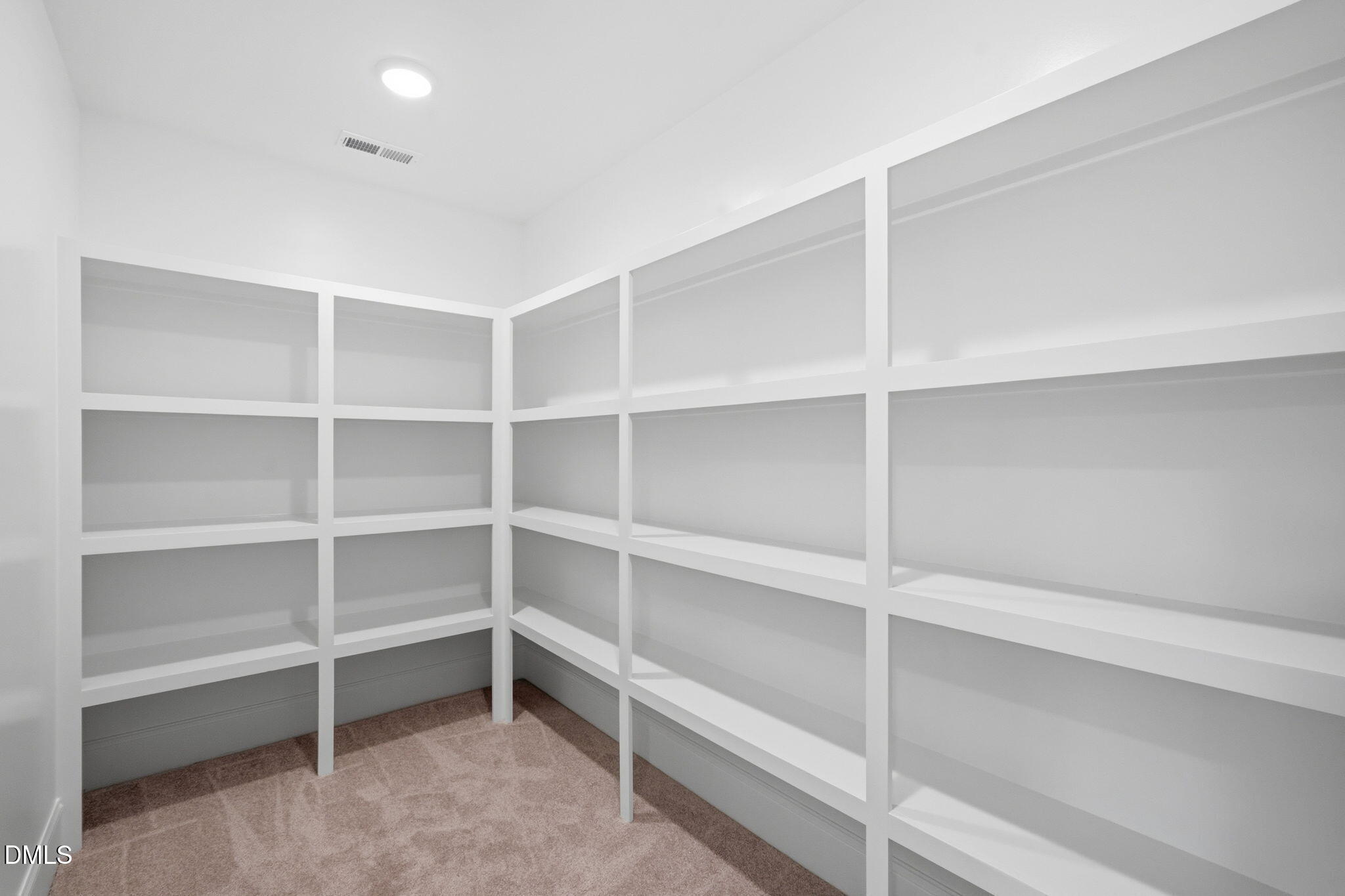 11214 Old Beulah Road Kenly, NC 27542 - Photo 46 of 56 a view of an empty walk in closet