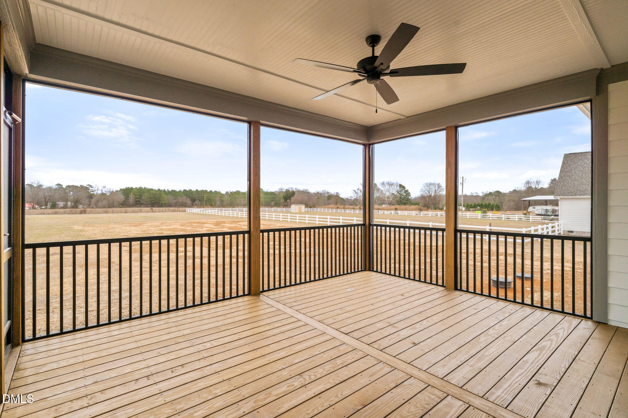 11214 Old Beulah Road Kenly, NC 27542 - Photo 47 of 56 a view of a wooden deck with a ocean view