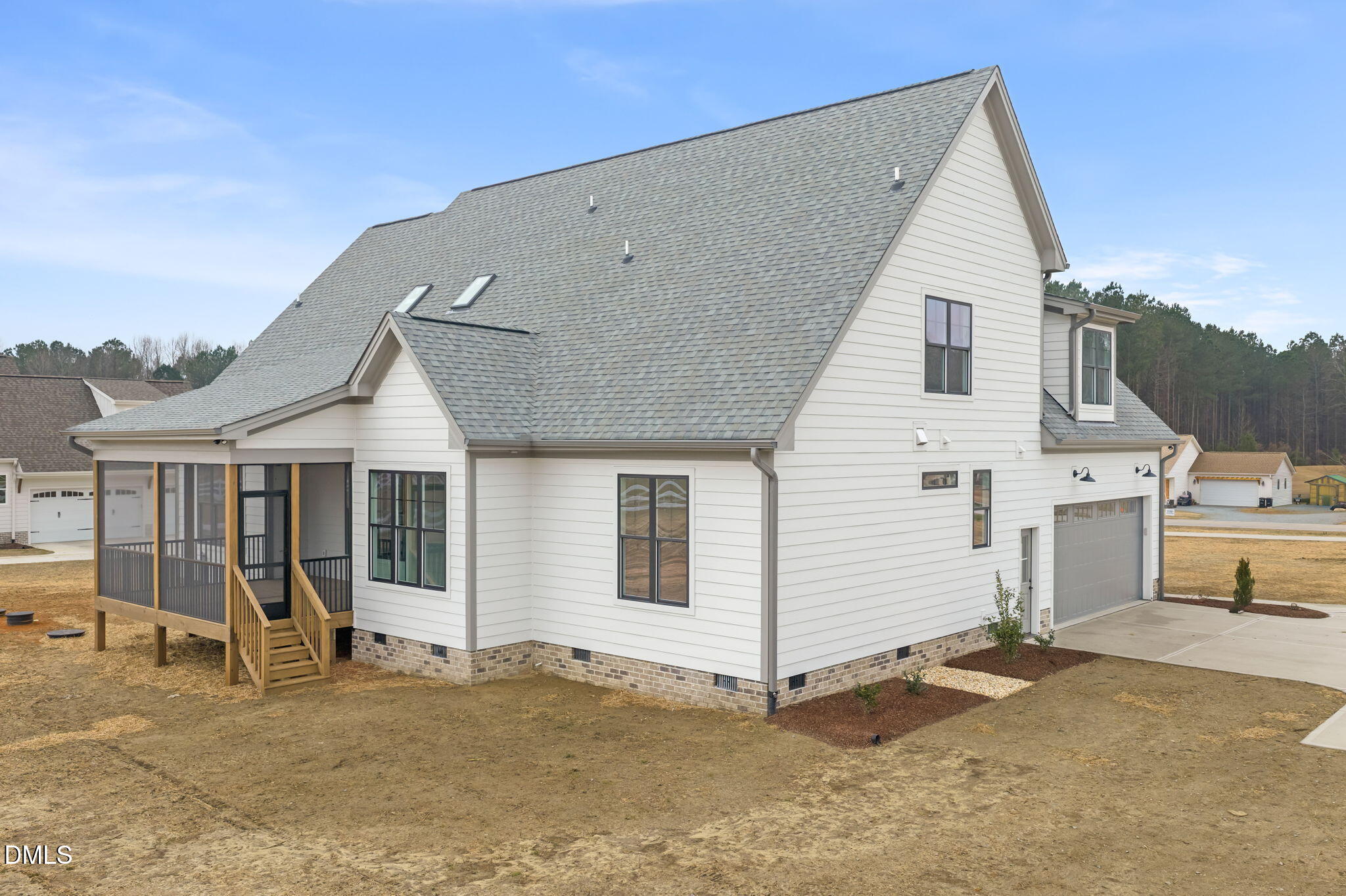 11214 Old Beulah Road Kenly, NC 27542 - Photo 55 of 56 a view of a white house with a yard
