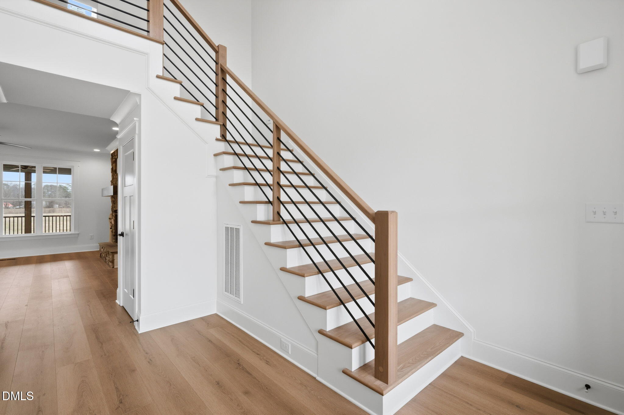 11214 Old Beulah Road Kenly, NC 27542 - Photo 6 of 56 a view of entryway and hall with wooden floor