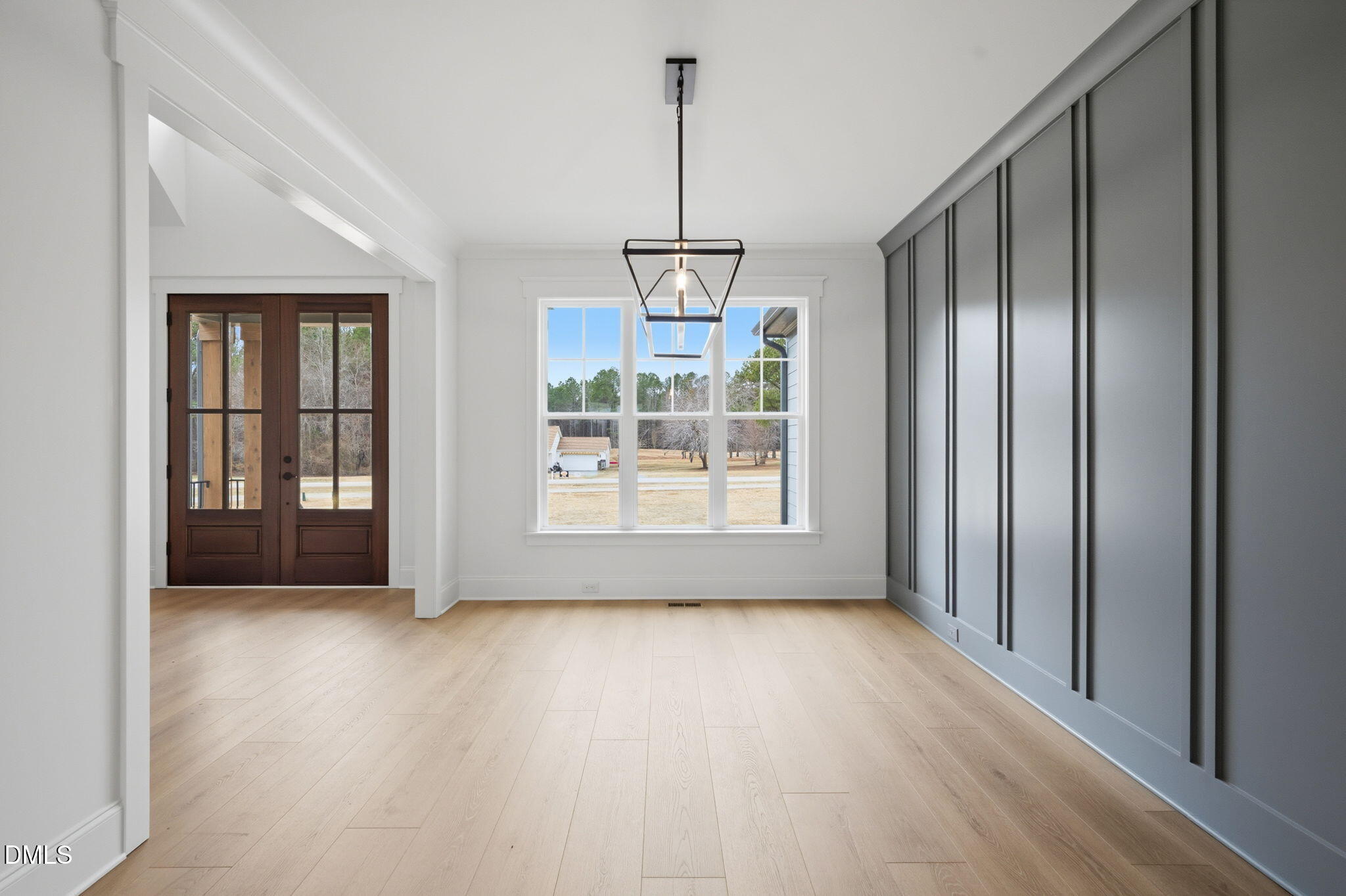 11214 Old Beulah Road Kenly, NC 27542 - Photo 8 of 56 a view of livingroom with furniture wooden floor and window